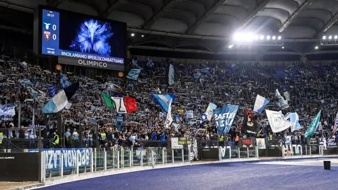 Lazio�?s supporters in the Curva Nord during the Serie A soccer match between SS Lazio and Torino FC at the Olimpico stadium in Rome, Italy, 16 April 2022. ANSA/RICCARDO ANTIMIANI