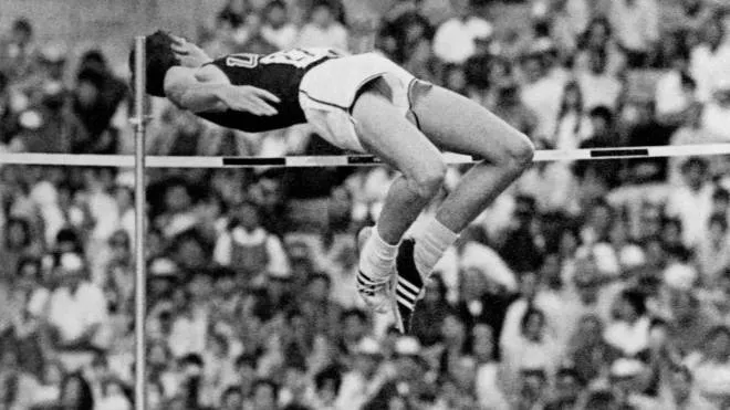 American athlete Dick Fosbury competes in the men's high jump final and wins the gold medal with a brand new style of jumping, on October 20 1968 at the Mexico Olympic Games. (Photo by AFP)
