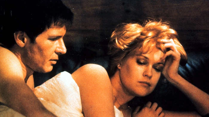 Harrison Ford e Melanie Griffith in 'Una donna in  carriera' (Olycom)
