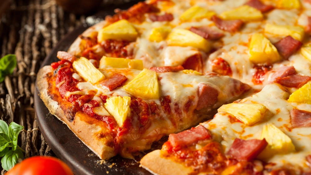 L'ananas sulla pizza è un condimento accettabile? - Foto: bhofack2/iStock