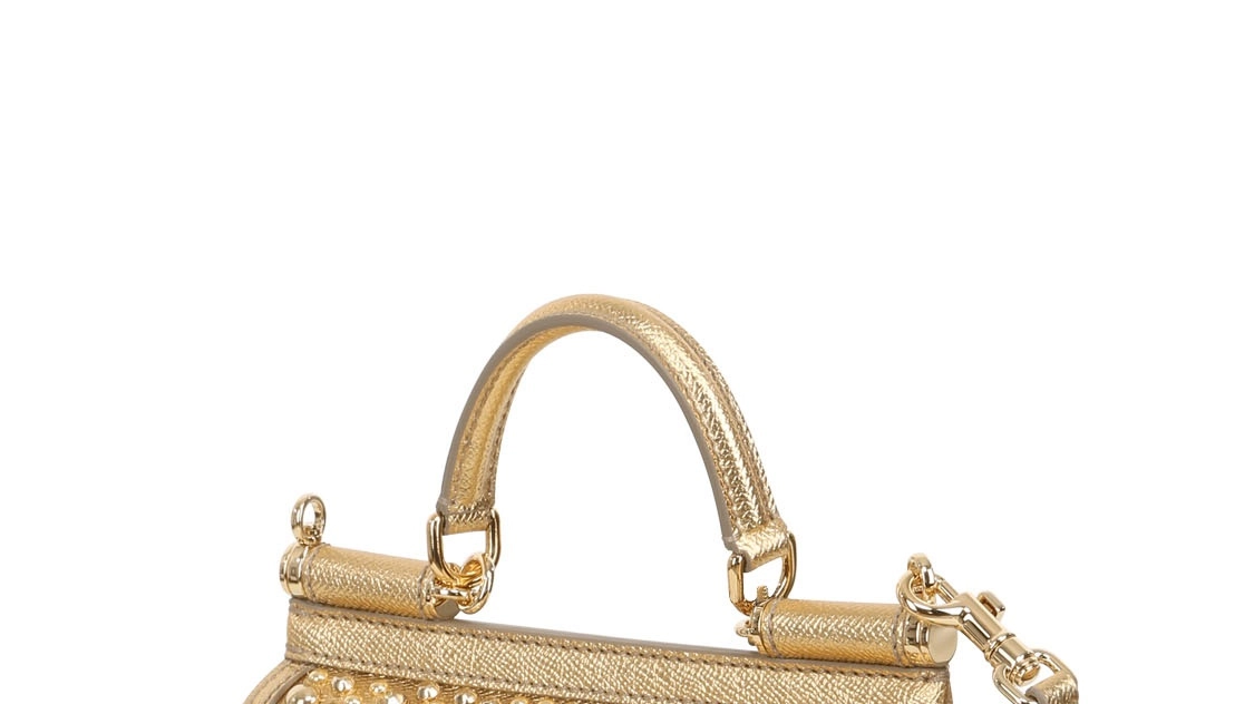 Una creazione di Dolce & Gabbana a tema "gold" per LuisaViaRoma