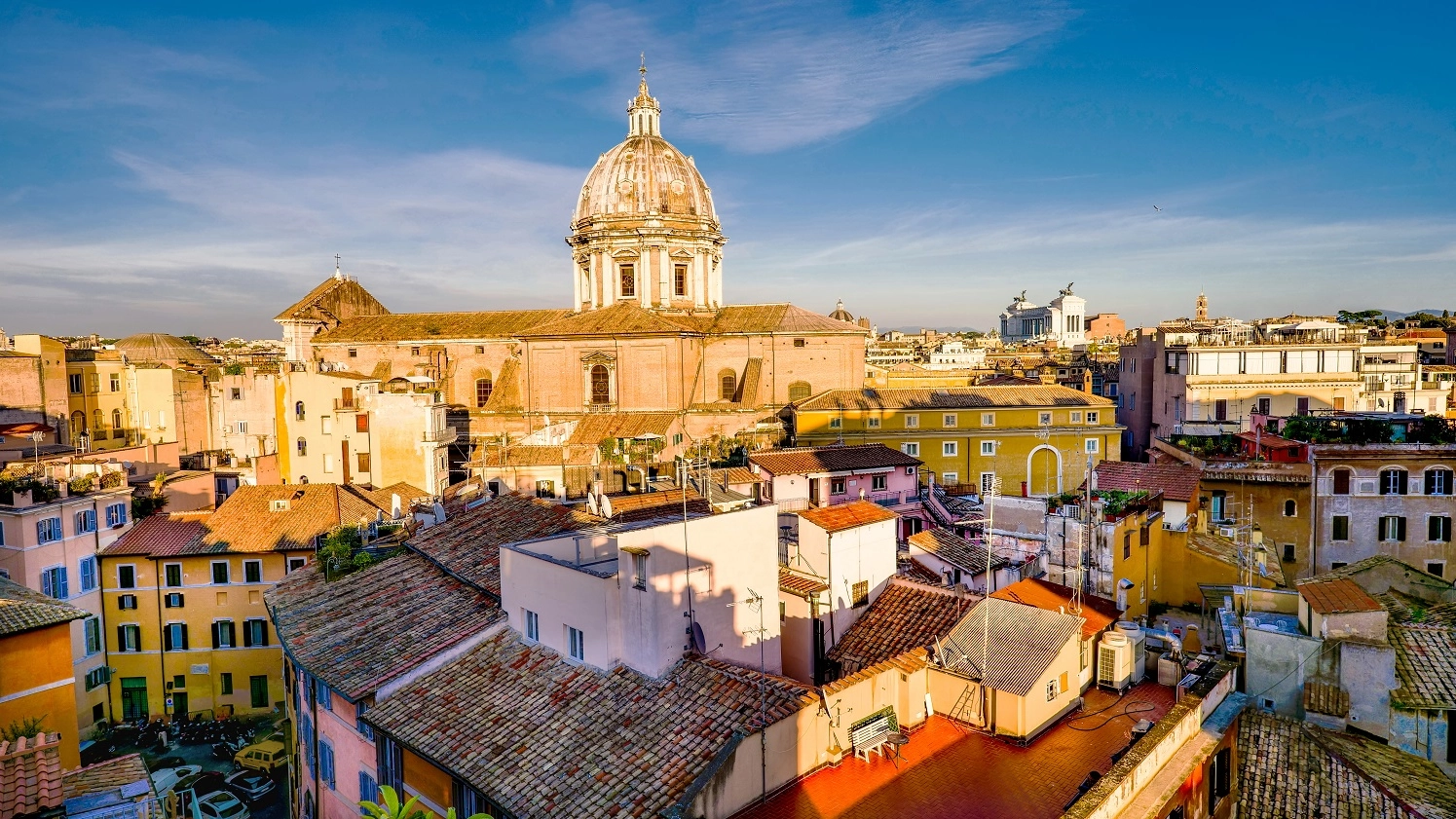 An intense blue sky over the rooftops of the historic and baroque heart of Rome
