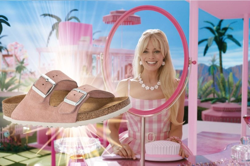 Margot Robbie in 'Barbie' e un sandalo rosa di Birkenstock
