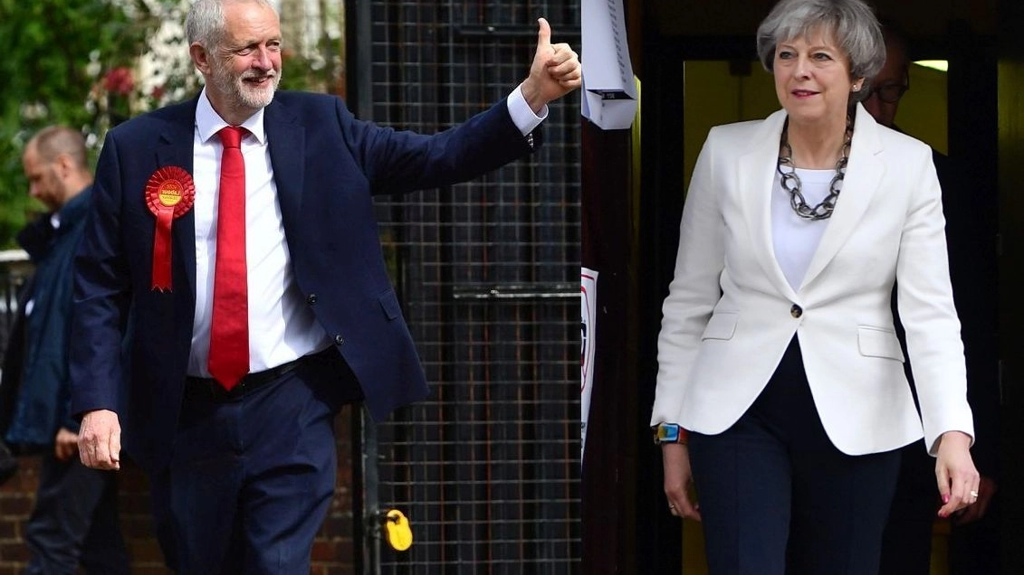 Elezioni Gran Bretagna, Jeremy Corbyn e Theresa May al voto (LaPresse/Afp)
