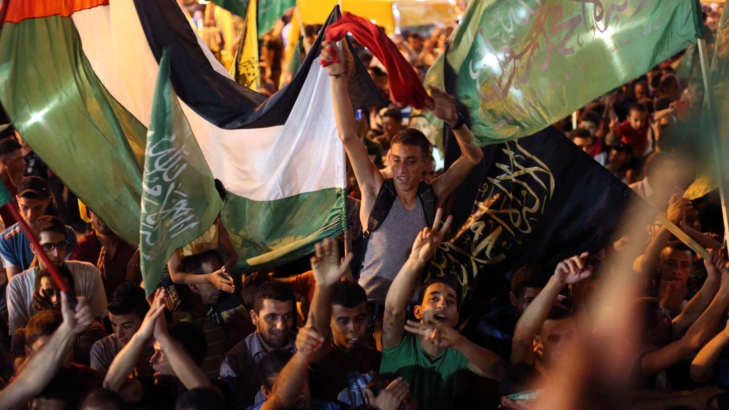 Gaza, la gioia per la tregua (Foto Afp)