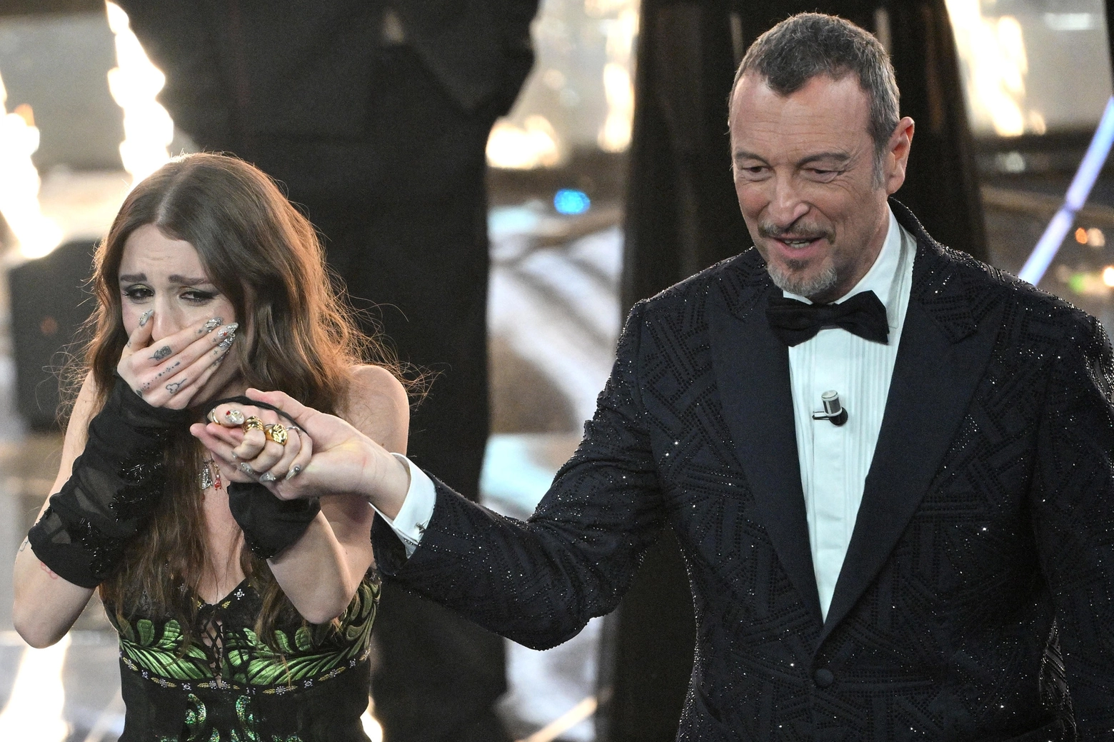 Angelina Mango e Amadeus dopo la proclamazione del vincitore di Sanremo 2024 (Ansa)
