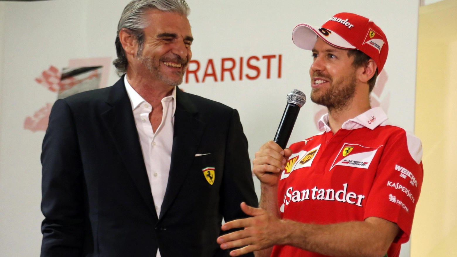 Sebastian Vettel con Maurizio Arrivabene (Ansa)