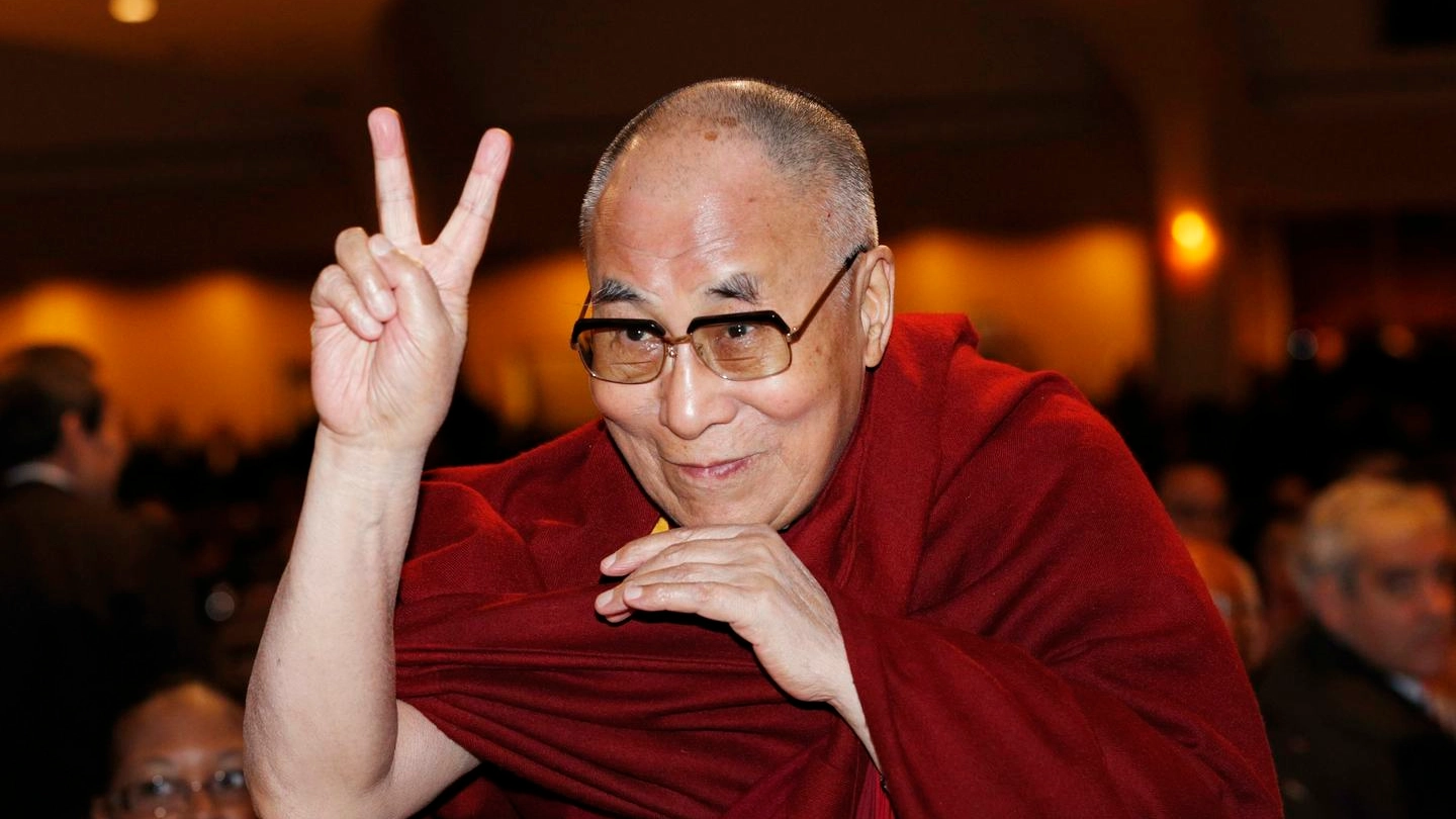 Il Dalai Lama al 'National Prayer Breakfast' di Washington alla presenza di Obama (REUTERS)