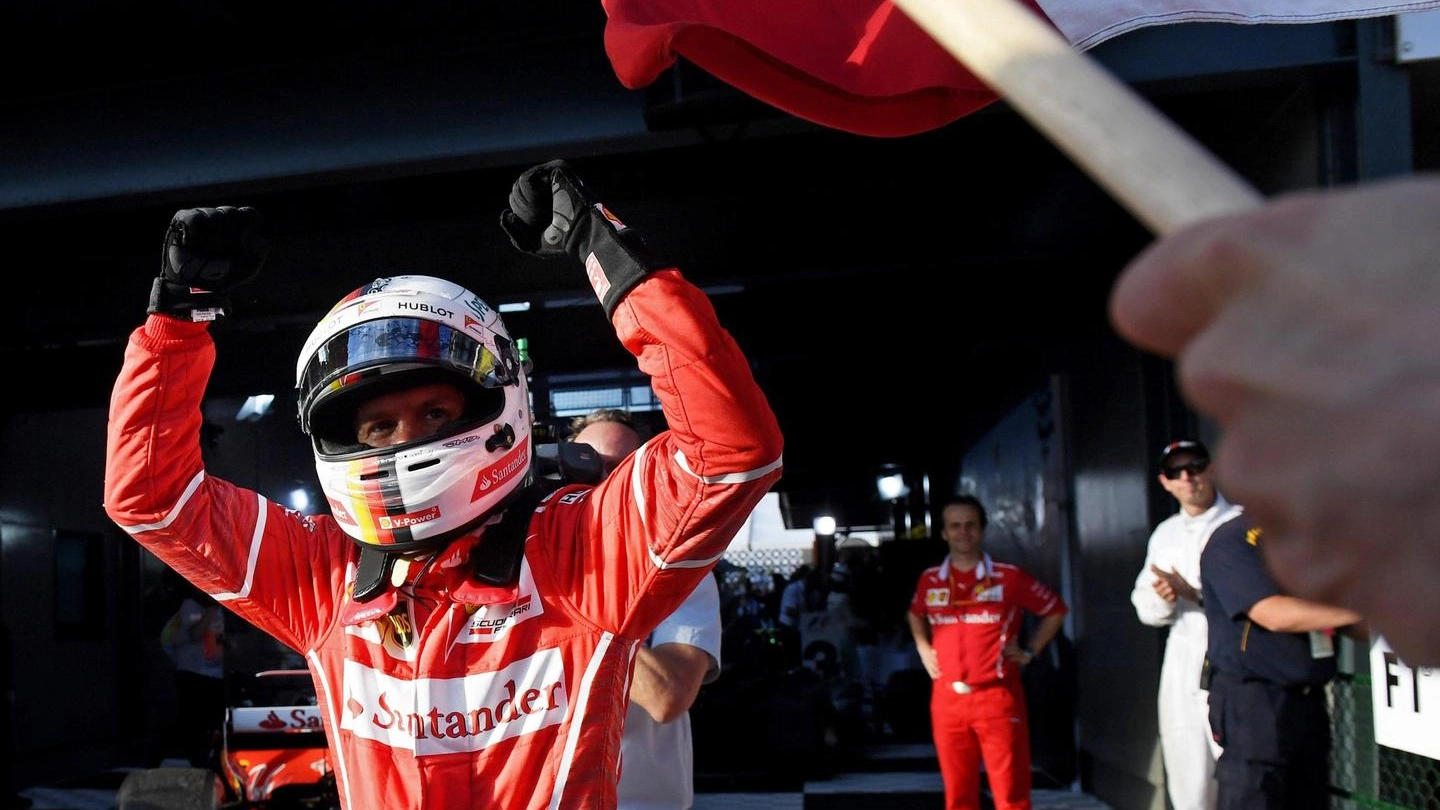 Formula 1, Ferrari, l'esultanza di Sebastian Vettel (Ansa)