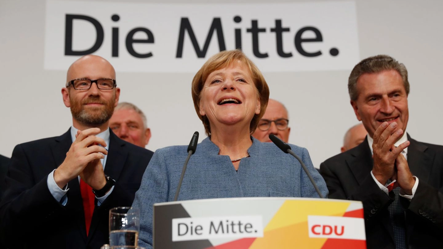 Elezioni Germania, la cancelliera Angela Merkel dopo i risultati degli exit poll (Afp)