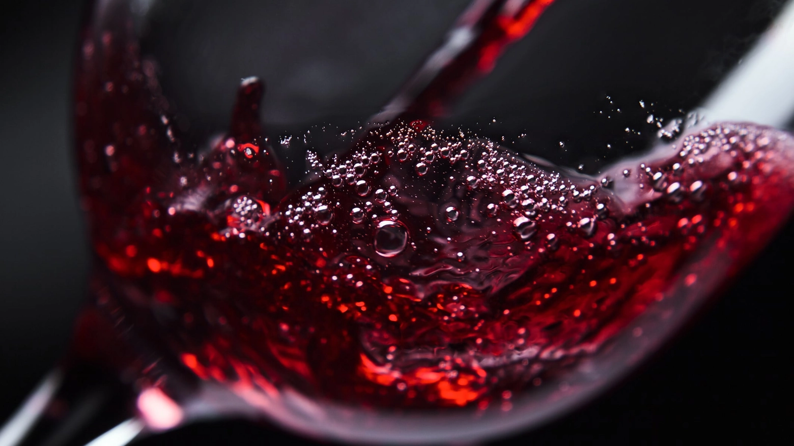 Red wine being poured into wine glass