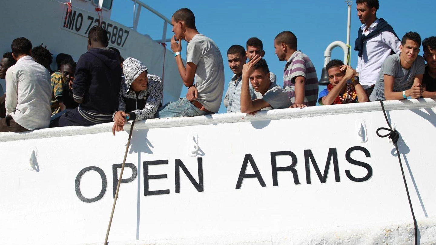 Migranti a bordo della nave Open Arms (Ansa)