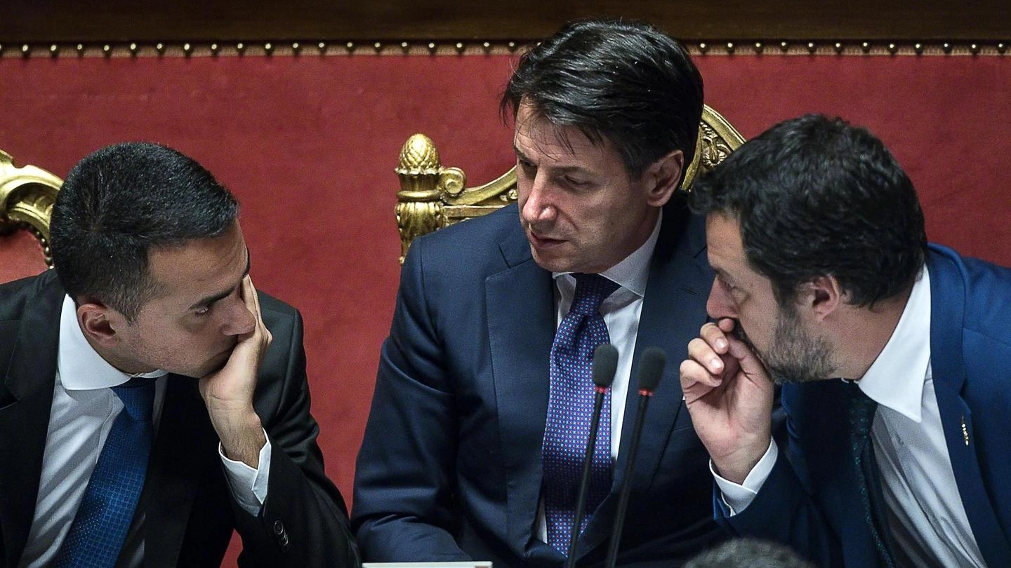 Il premier Conte con i suoi vice Di Maio e Salvini (Ansa)