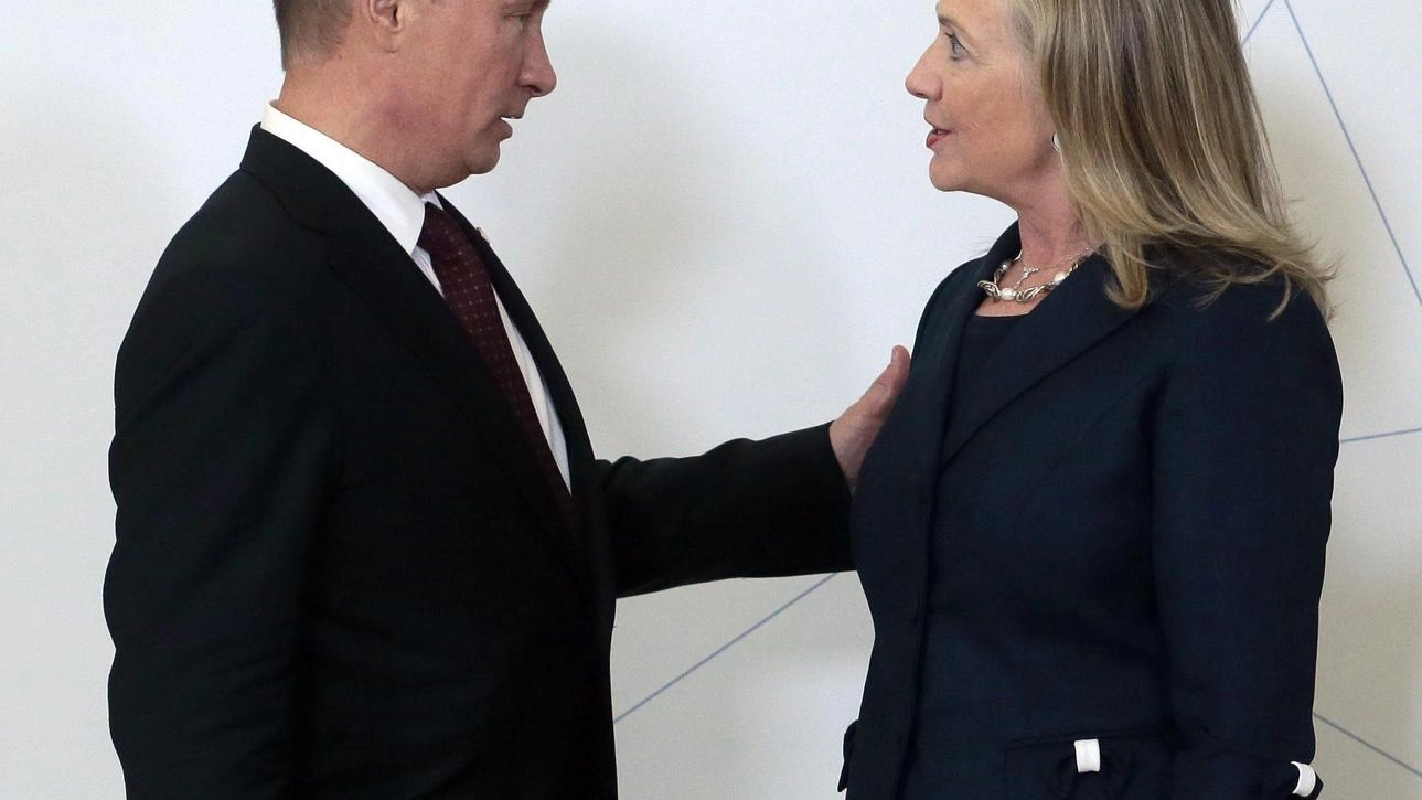 Vladimir Putin e Hillary Clinton (Ansa)