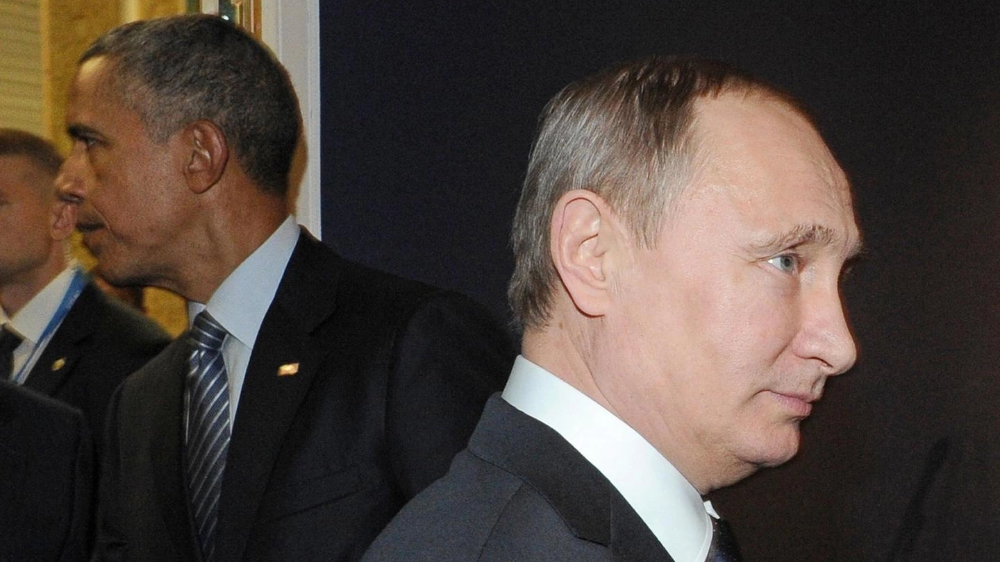 Obama e Putin al termine del faccia a faccia a Parigi (Ansa)