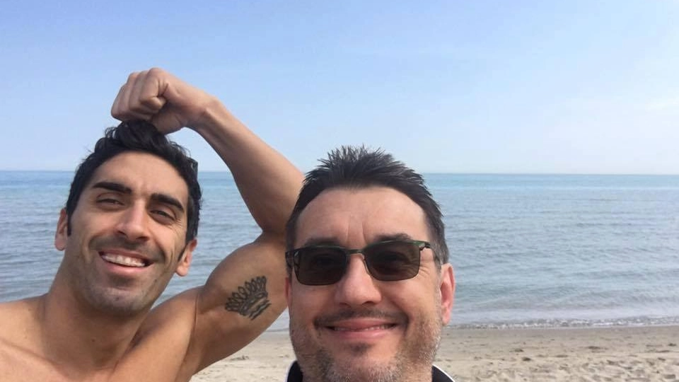 Il campione di nuoto Filippo Magnini e il medico Guido Porcellini