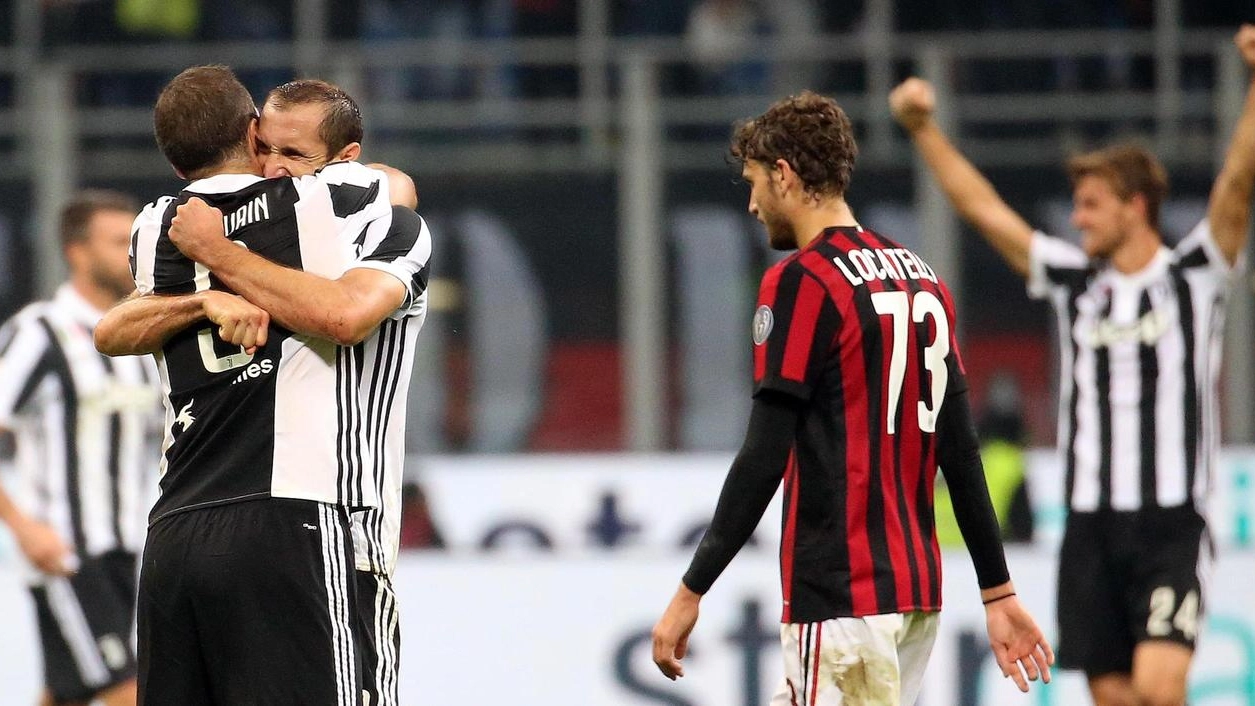 Milan-Juventus, la gioia di Higuain e Chiellini (foto Ansa)