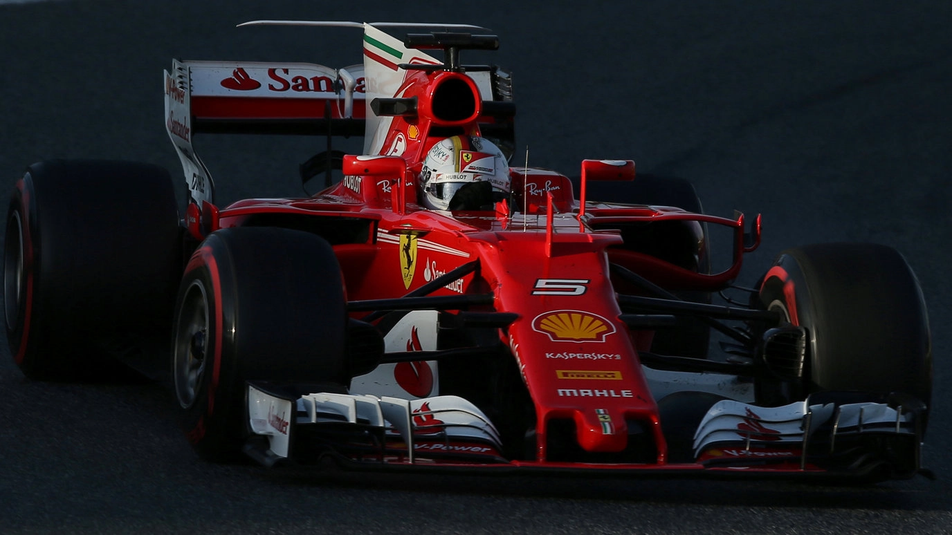 Formual 1, orari tv. Nella foto la Ferrari di Vettel nei test di Montmelò (LaPresse)