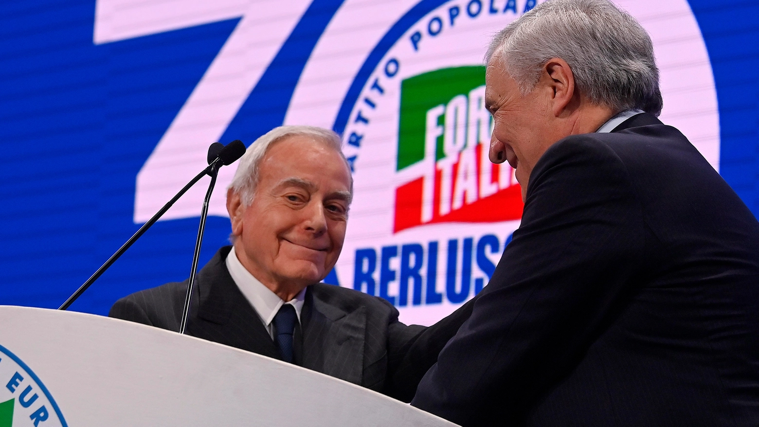 Gianni Letta con Antonio Tajani sul palco della festa di Forza Italia (Ansa)