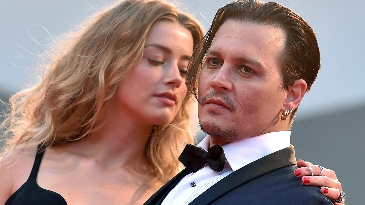 Johnny Depp e la moglie Amber Heard (Ansa)
