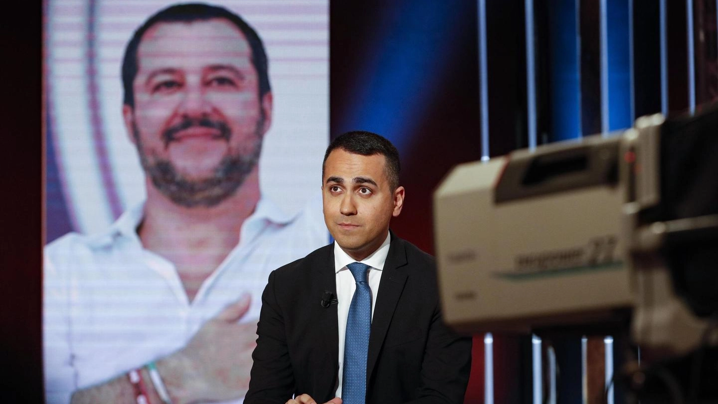 Luigi Di Maio, dietro un'immagine di Salvini (Ansa)