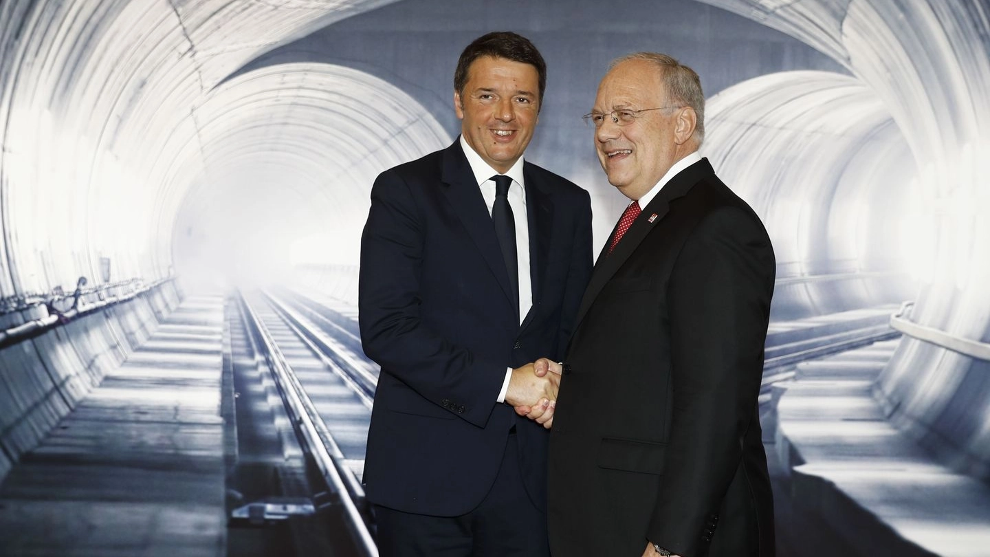Il premier Renzi e il presidente svizzero  Schneider-Ammann (AFP)