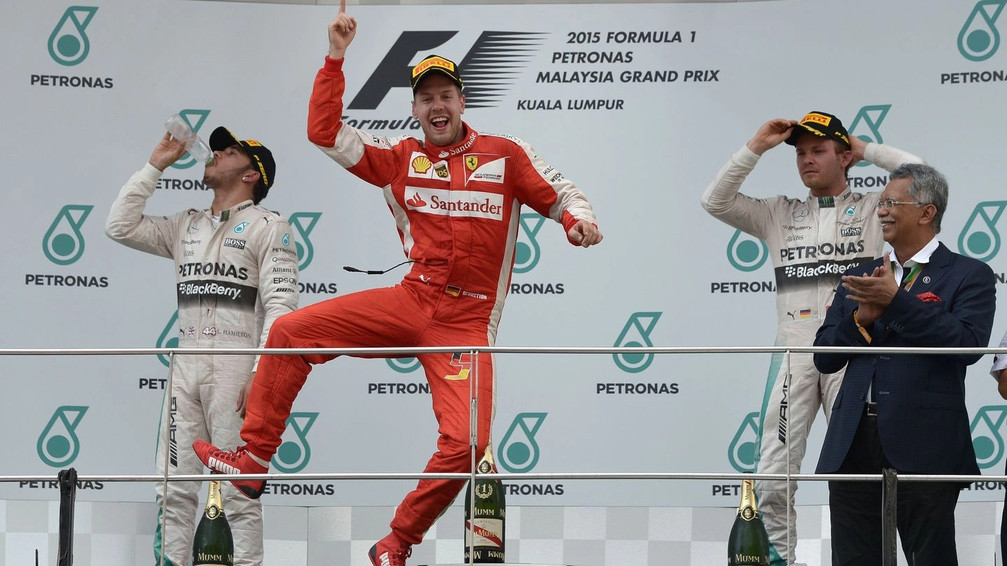 Vettel sul gradino più alto del podio (Afp)