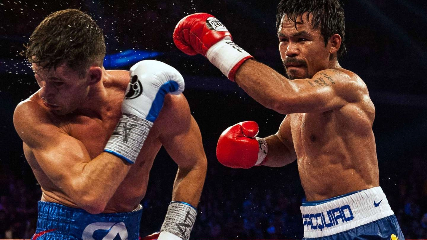 Manny Pacquiao colpisce Chris Algieri (AFP)