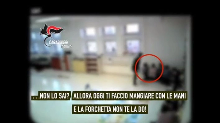 Torino, maltrattamenti all'asilo: un frame del video dei carabinieri 