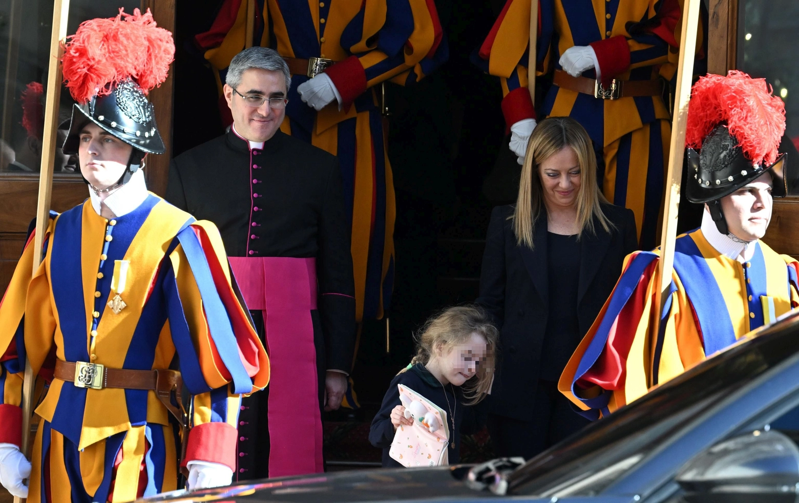 Ginevra, the daughter of Italian Prime Minister, Giorgia Meloni (R), as she arrives at San Damaso Court with her mother and his father Andrea Giambruno for a meeting with Pope Francis at the Vatican, 10 January 2023. ANSA/CLAUDIO PERI