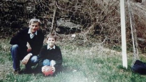 Marco Biagi con il figlio Lorenzo quand'era bambino