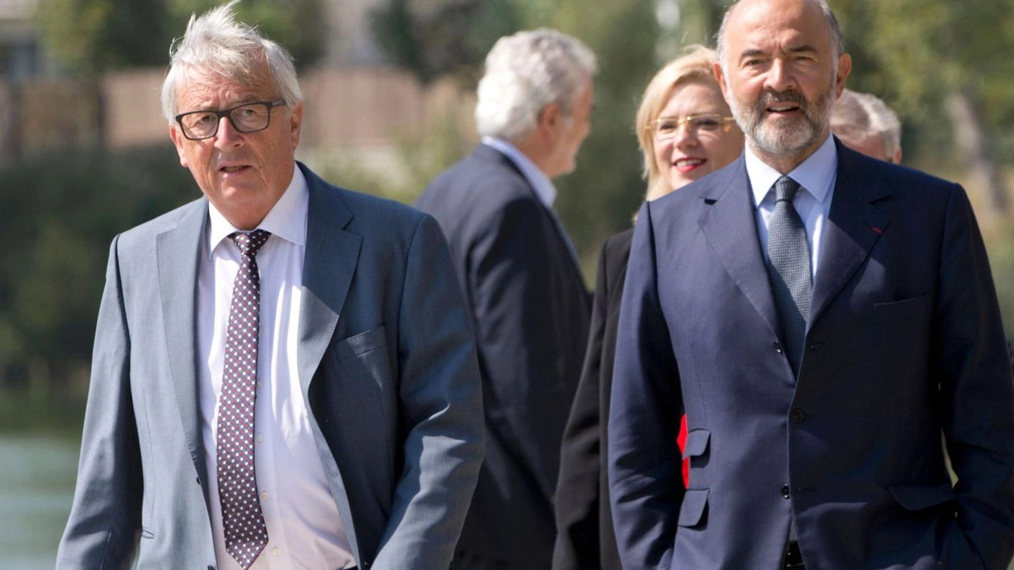 Jean Claude Juncker e Pierre Moscovici (Afp)