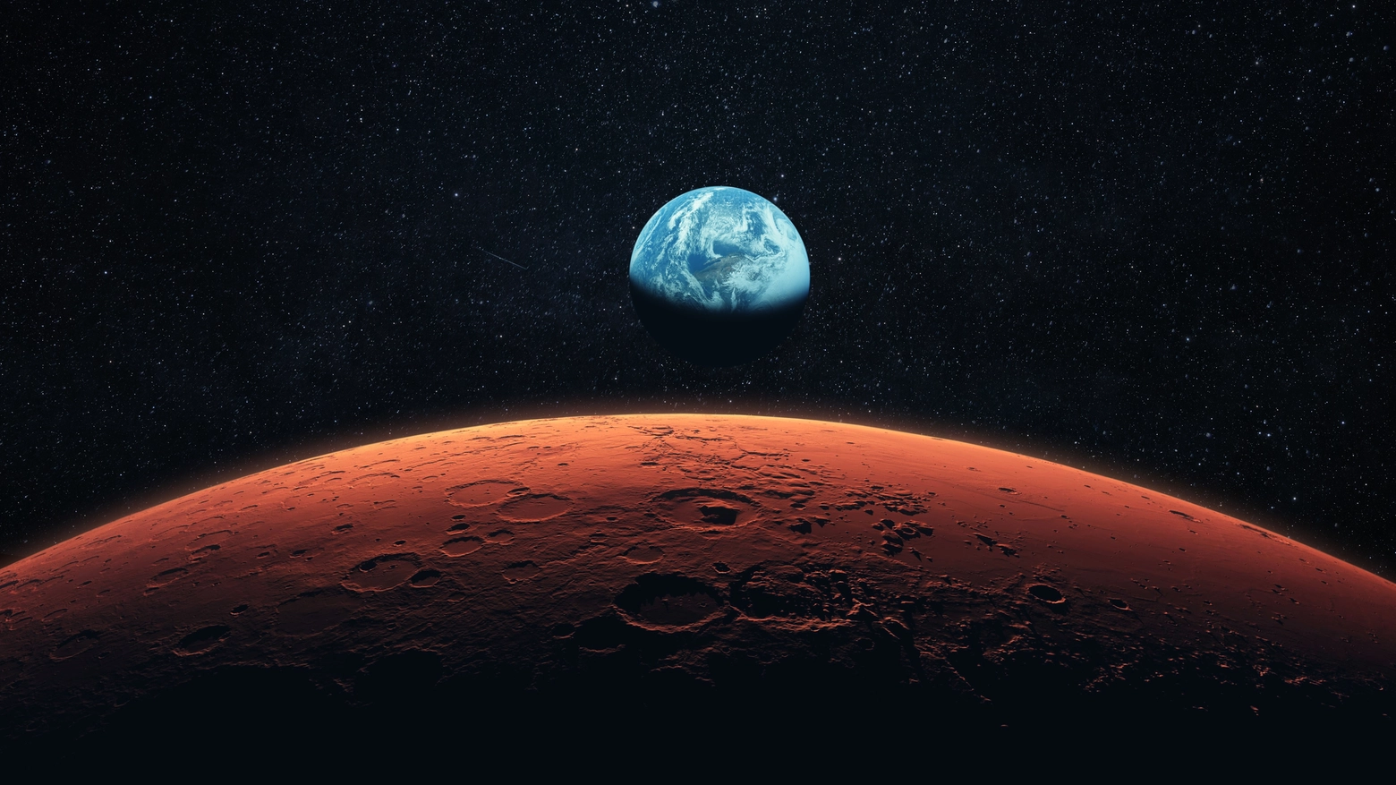Marte e sullo sfondo la Terra