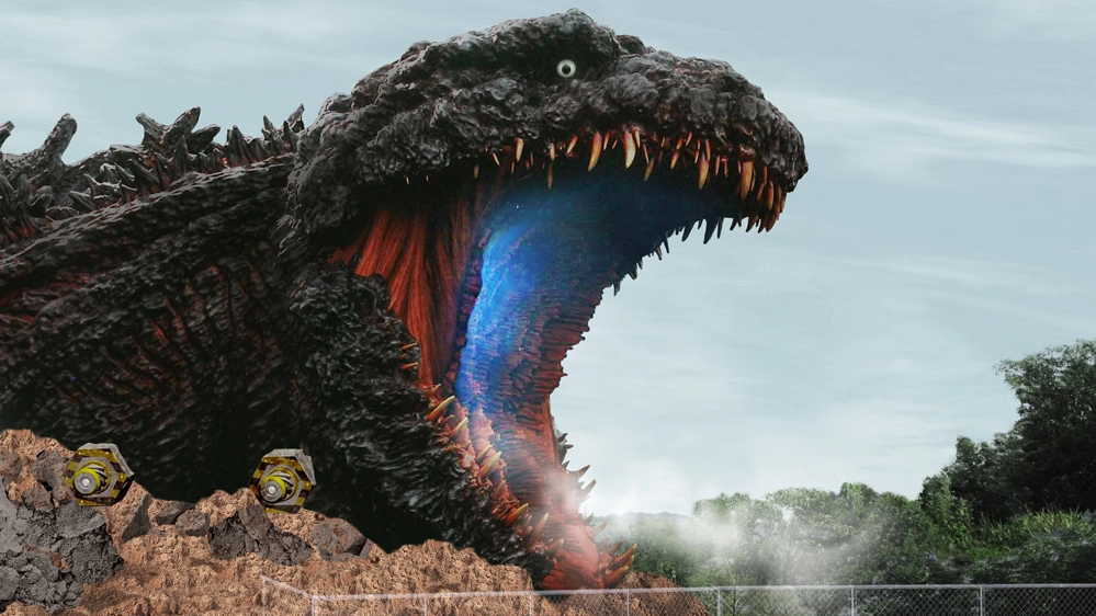 Nelle fauci di Godzilla - Foto: twitter/GODZILLA_AWAJI - TM & TOHO CO., LTD