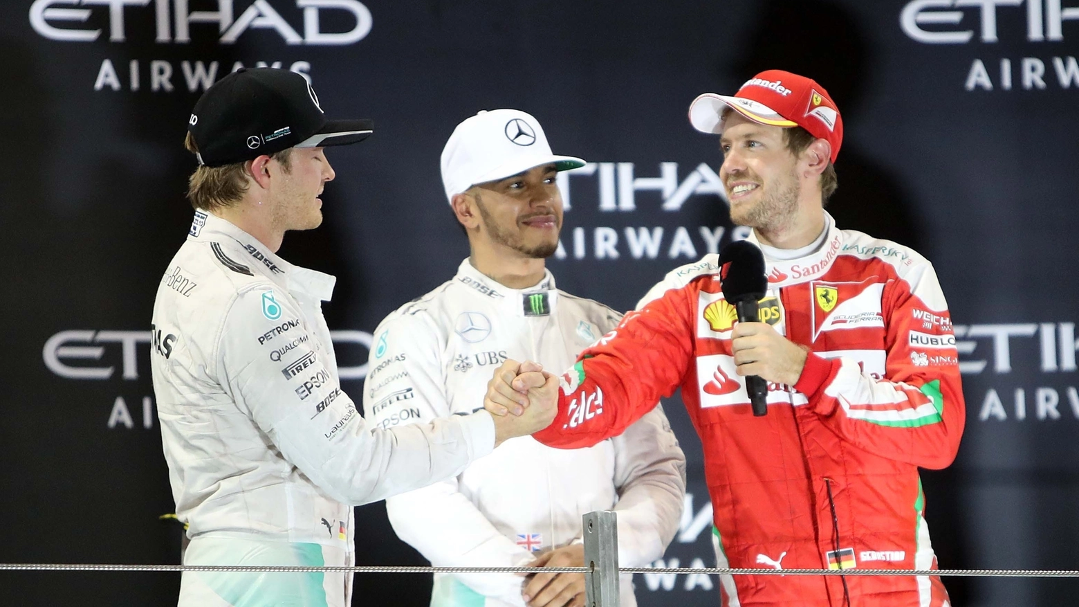 Rosberg, Hamilton e Vettel (PA)