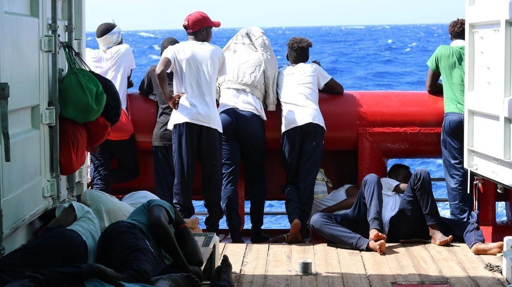 Migranti a bordo della Ocean Viking (Ansa)