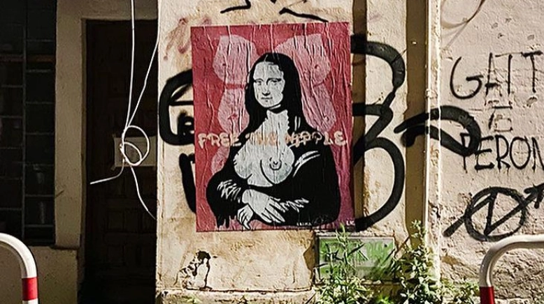 La Gioconda in topless sul muro in via Dalmati a Roma (foto da Instagram di Laika1954)