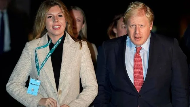epa08259959 (FILE) British Prime Minister Boris Johnson (R) and his partner Carrie Symonds (L) arrive at the count result for Uxbridge and South Ruislip constituency at Brunel University during the general elections in London, Britain, 13 December 2019 (reissued 29 February 2020). Symonds announced on an Instagram post published on 29 February 2020 that she and Johnson have been engaged since the end of 2019 and that she was pregnant, with the baby due in the early summer of 2020.  EPA/WILL OLIVER *** Local Caption *** 55705363
