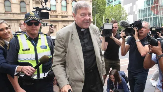 epa08346432 (FILE) - Australian Cardinal George Pell (C) leaves the County Court in Melbourne, Victoria, Australia, 26 February 2019 (reissued 06 April 2020). The Australian high court on 07 April 2020 is set to rule on Cardinal George Pell's final appeal to overturn his conviction for child sexual abuse. Pell is serving a six-year jail sentence for abusing two boys in the 1990s.  EPA/DAVID CROSLING AUSTRALIA AND NEW ZEALAND OUT