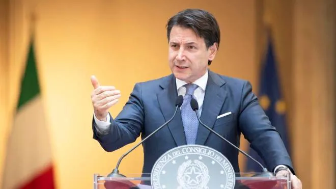epa08463346 A handout photo made available by Palazzo Chigi shows Italian Prime Minister, Giuseppe Conte, during a press conference on the day of the reopening of borders between the Regions amid an easing of restrictions during Phase 2 of the Covid-19 Coronavirus emergency, a fundamental step for the resumption of activities in the Country, at the Chigi Palace in Rome, Italy, 03 June 2020.  EPA/FILIPPO ATTILI / CHIGI PALACE HANDOUT  HANDOUT EDITORIAL USE ONLY/NO SALES