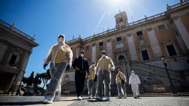 Workers arrive for sanitization operations at Campidoglio in Rome, Italy, 06 June 2020. Several countries around the world have started to ease COVID-19 lock-down restrictions in an effort to restart their economies and help people in their daily routines after the outbreak of coronavirus pandemic.ANSA/ANGELO CARCONI