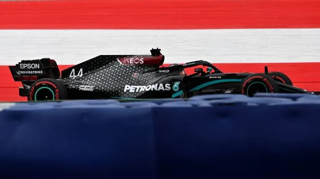 Mercedes' British driver Lewis Hamilton steers his car during the first practice session at the Austrian Formula One Grand Prix on July 3, 2020 in Spielberg, Austria. - Seven months after they last competed in earnest, the Formula One circus will push a post-lockdown ‘re-set’ button to open the 2020 season in Austria on July 5. (Photo by Joe Klamar / various sources / AFP)