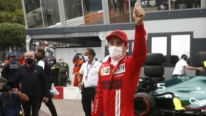 epa09219878 Monaco's Formula One driver Charles Leclerc of Scuderia Ferrari Mission Winnow reacts after taking the pole position during the qualifying session of the Formula One Grand Prix of Monaco at the Circuit de Monaco in Monte Carlo, 22 May 2021. The Formula One Grand Prix of Monaco will take place on 23 May 2021.  EPA/SEBASTIEN NOGIER