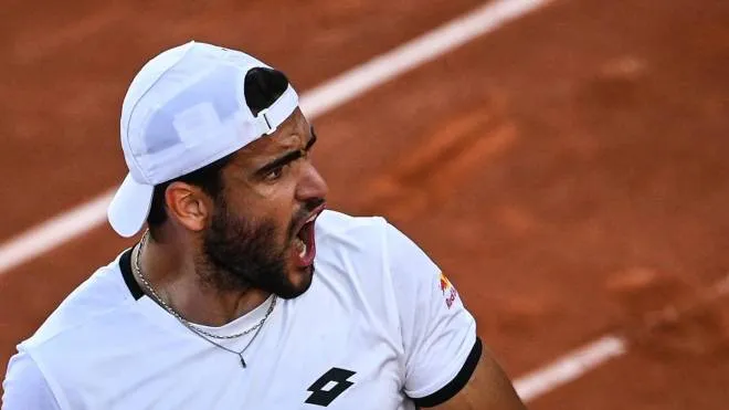 Italy's Matteo Berrettini celebrates after winning a point against South Korea's Kwon Soon-woo during their men's singles third round tennis match on Day 7 of The Roland Garros 2021 French Open tennis tournament in Paris on June 5, 2021. (Photo by Anne-Christine POUJOULAT / AFP)