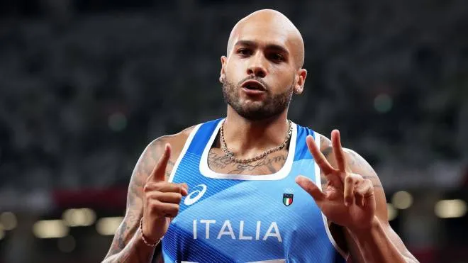 epa09382324 Lamont Marcell Jacobs of Italy gestures after his run in the Men's 100m heats during the Athletics events of the Tokyo 2020 Olympic Games at the Olympic Stadium in Tokyo, Japan, 31 July 2021.  EPA/DIEGO AZUBEL