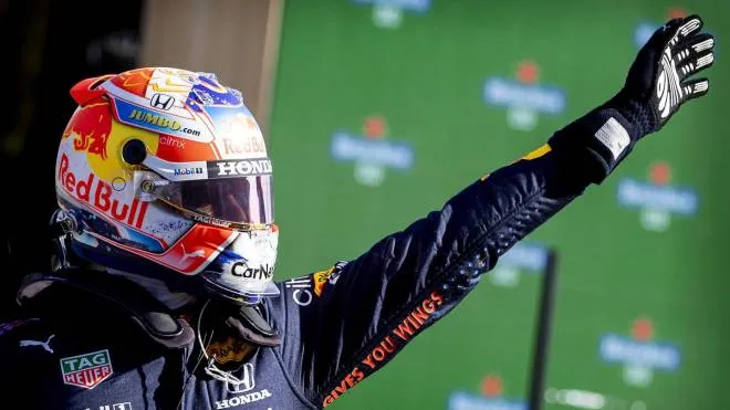 epa09447319 Max Verstappen (Red Bull Racing) reacts after taking pole position during qualifying of the Formula 1 Grand Prix of the Netherlands at the Zandvoort circuit, in Zandvoort, The Netherlands, 04 September 2021. The Formula One Grand Prix of the Netherlands, which takes place on 05 September, will be held at Circuit Zandvoort for the first time in 36 years, with about 70,000 visitors expected.  EPA/KOEN VAN WEEL