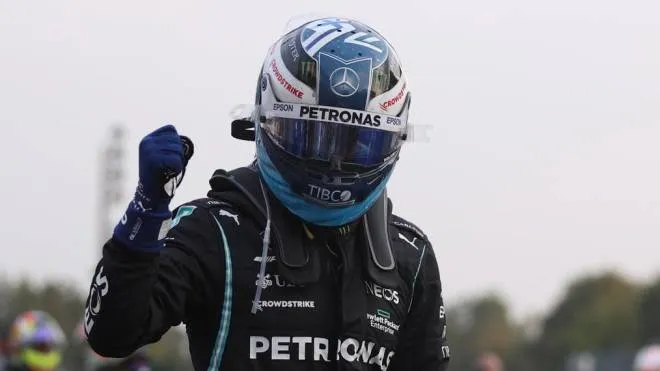 epa09460059 Finnish Formula One driver Valtteri Bottas of Mercedes-AMG Petronas reacts after he took pole position during the qualifying session of the Formula One Grand Prix of Italy at the Autodromo Nazionale Monza race track in Monza, Italy, 10 September 2021. The 2021 Formula One Grand Prix of Italy will take place on 12 September 2021.  EPA/LARS BARON / POOL