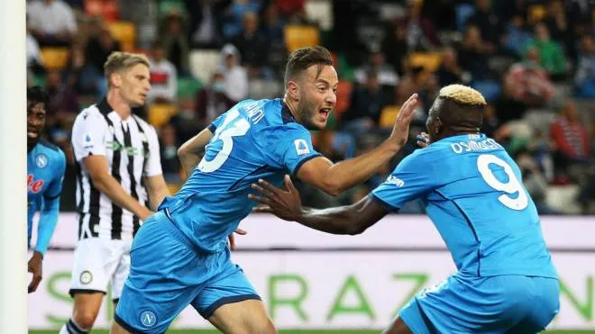 Napoli�s Amir Rrahmani (C) jubilates with his teammate Victor Osimhen after scoring the goal during the Italian Serie A soccer match Udinese Calcio vs SSC Napoli at the Friuli - Dacia Arena stadium in Udine, Italy, 20 September 2021. ANSA/GABRIELE MENIS