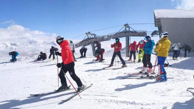People ski on the Presena Glacier, in the Pontedilegno-Tonale area between Trentino and Lombardy, Italy, 22 May 2021. Today and tomorrow the plants will be open after closing due to Covid. ANSA/ MARTINA VALENTINI