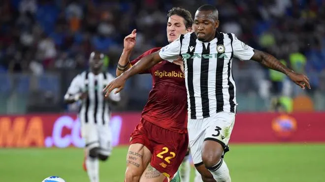 AS Roma's Nicolo' Zaniolo (L) vies for the ball with Udinese's Samir during the Italian Serie A soccer match between AS Roma and Udinese Calcio at the Olimpico stadium in Rome, Italy, 23 September 2021.  ANSA/ETTORE FERRARI